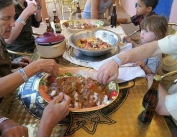 Group enjoying peanut stew