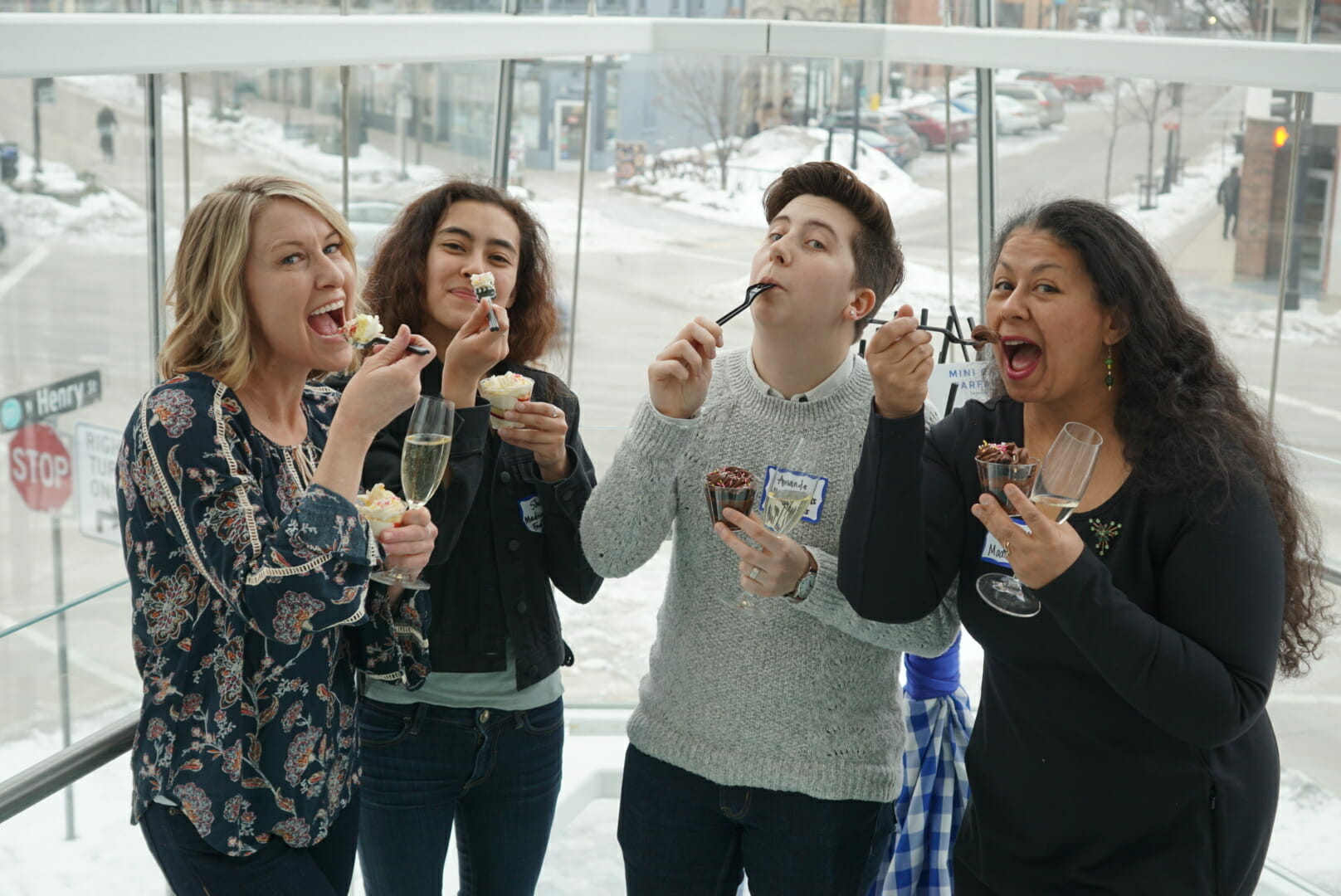 Tour guides enjoying champagne and ice cream