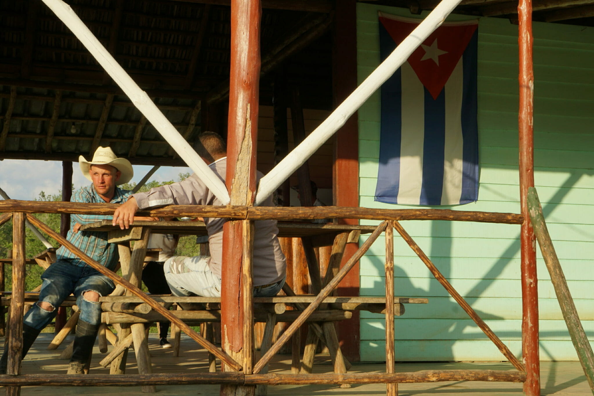 Farmers sitting on patio bench