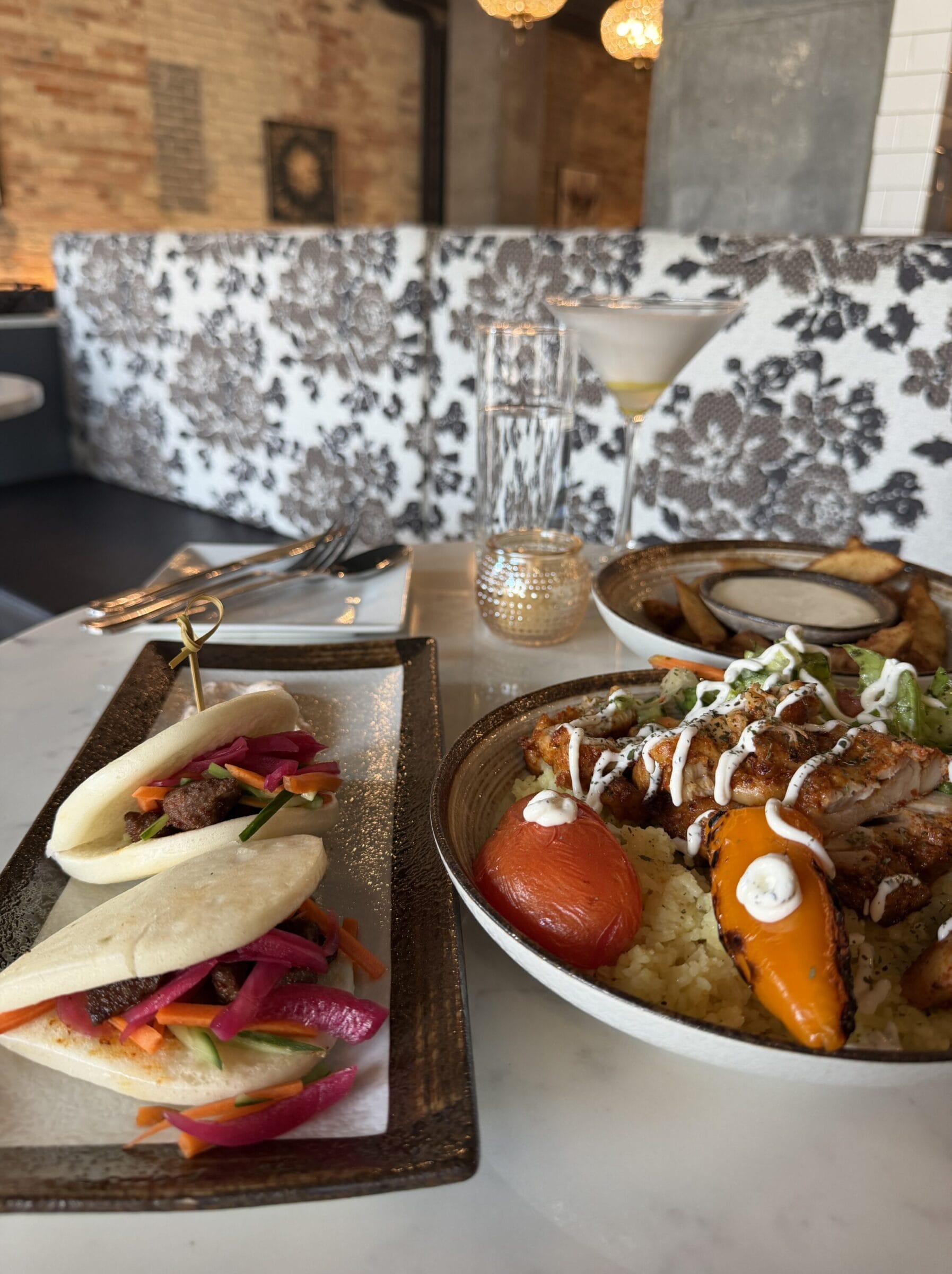 Lamb bao and chicken kebab plate at eloura