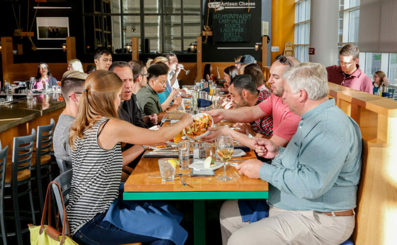 Food and drink group tour dining at long table