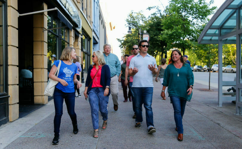 Food and drink group tour walking in downtown Madison, Wisconsin