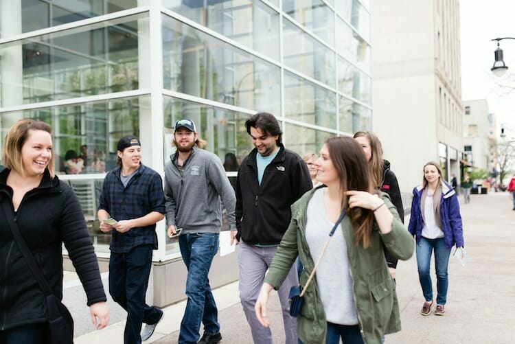 Food tour group walking around capitol square in Madison, Wisconsin